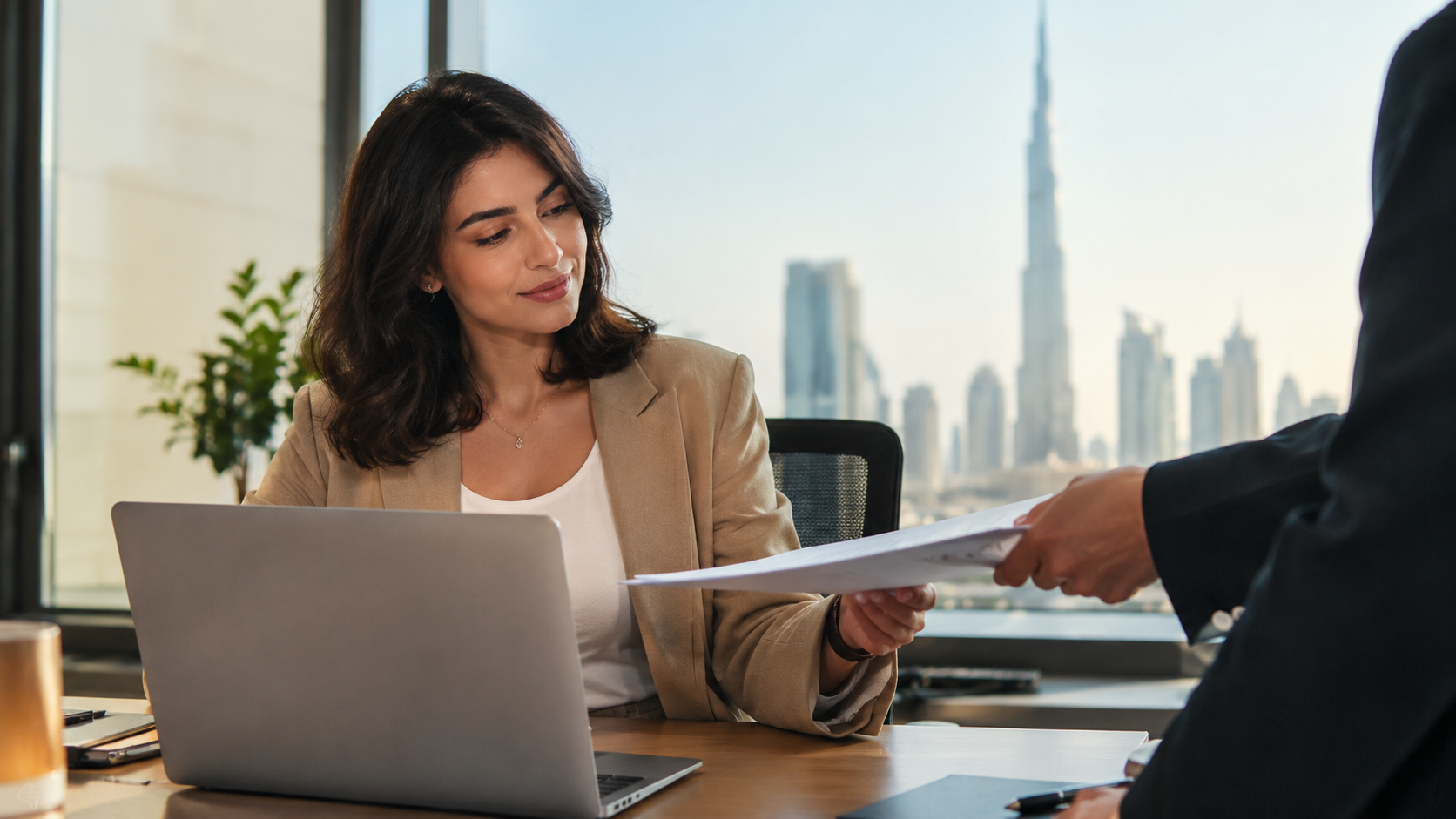 Business owner managing HR tasks without an HR department in a Dubai office